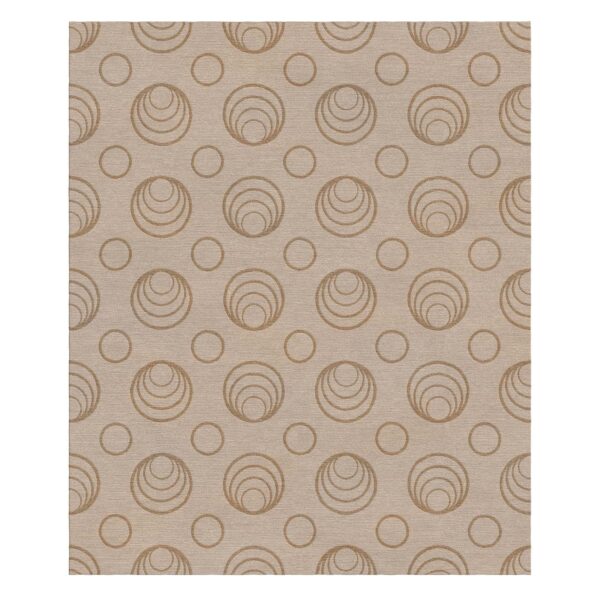 Tapis touffeté neutre présentant des cercles concentriques en taupe clair sur fond crème. Le motif alterne entre de grands cercles à plusieurs anneaux et de plus petits cercles simples.