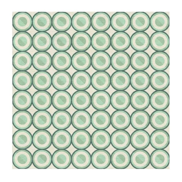Tapis géométrique touffeté avec des cercles concentriques vert menthe disposés en motif quadrillé sur fond crème.